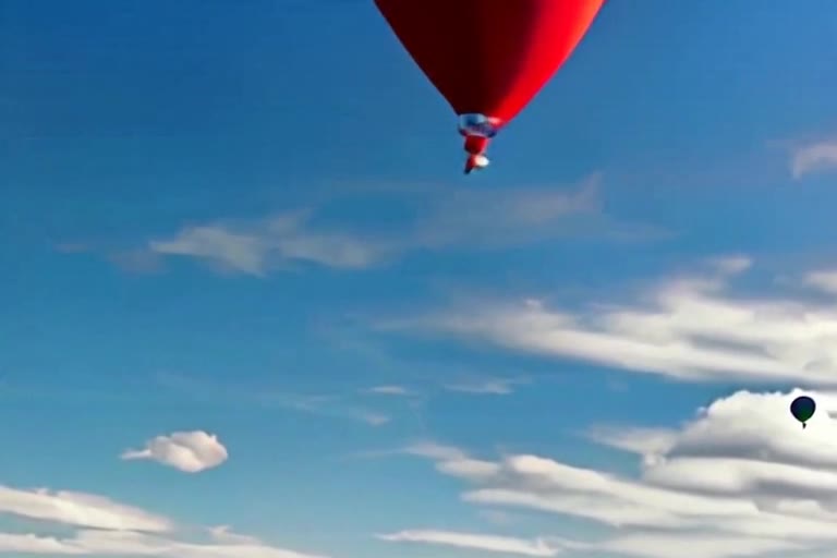Last frame of the balloon clip: the balloon is in the middle of the sky